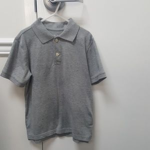 Boys polo style shirt.